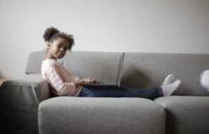 Children on a couch learning about accountability