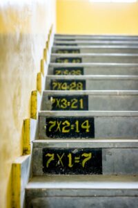 Learning maths equations on the stairs at home