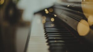 Light specs reflecting above piano keys