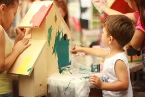 A young child painting