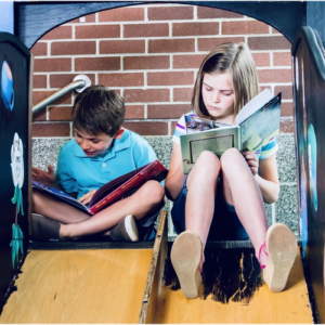 Two children reading together