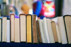 A row of books on a shelf in a library