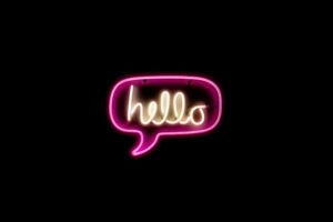 A hello speech bubble fluorescent sign 