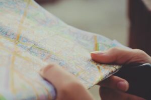 A child holding a map